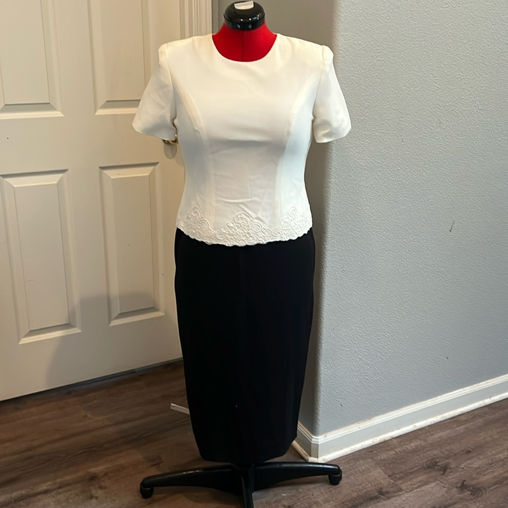 Beautiful full,  never worn elegant dress.  Perfect for formal affairs.